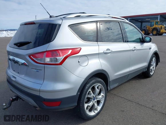 2015 Ford Escape Titanium with VIN 1FMCU9J97FUA05003, listed as a IAAI auction lot 41721214 with 51,644 mi miles. Bid and sale history available at carsss.com. Image 4.