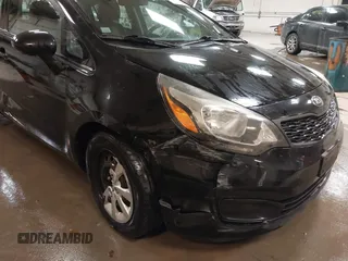 2014 Kia Rio LX with VIN KNADM4A31E6404206, listed as a IAAI auction lot 41543090 with 70,563 mi miles and . Bid and sale history available at DreamBid. Image 6.