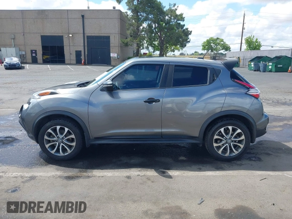 2015 Nissan Juke S with VIN JN8AF5MRXFT513258, listed as a IAAI auction lot 42213721 with 91,972 mi miles and . Bid and sale history available at DreamBid. Image 14.