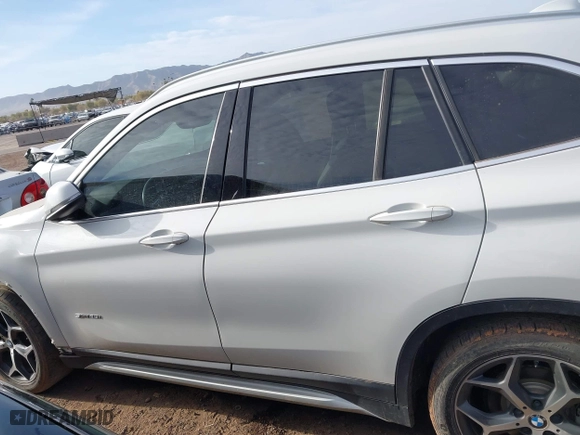 2018 BMW X1 sDrive28i with VIN WBXHU7C32J5H41587, listed as a IAAI auction lot 41538394 with 125,804 mi miles. Bid and sale history available at carsss.com. Image 15.