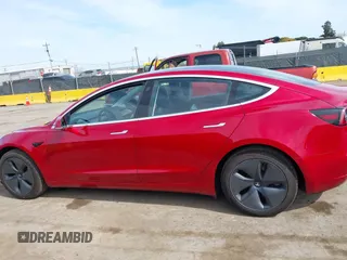 2020 Tesla Model 3 Long Range with VIN 5YJ3E1EB6LF649824, listed as a IAAI auction lot 41766020 with 71,230 mi miles. Bid and sale history available at carsss.com. Image 15.