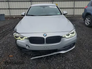2018 BMW 3 Series 330i with VIN WBA8B9G50JNU98561, listed as a Copart auction lot 61293325 with 106,656 mi miles and Clean title. Bid and sale history available at DreamBid. Image 5.