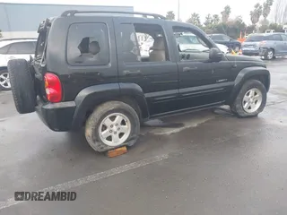 2004 Jeep Liberty Limited with VIN 1J4GL58K94W318379, listed as a IAAI auction lot 41802645 with 275,834 mi miles. Bid and sale history available at carsss.com. Image 4.