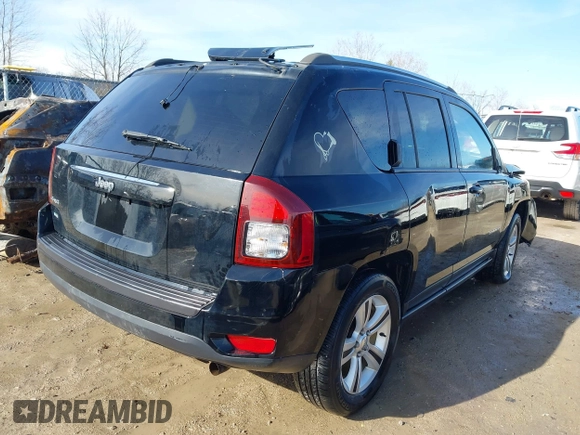 2015 Jeep Compass Sport with VIN 1C4NJDBBXFD114579, listed as a IAAI auction lot 41911501 with 95,732 mi miles and . Bid and sale history available at carsss.com. Image 4.