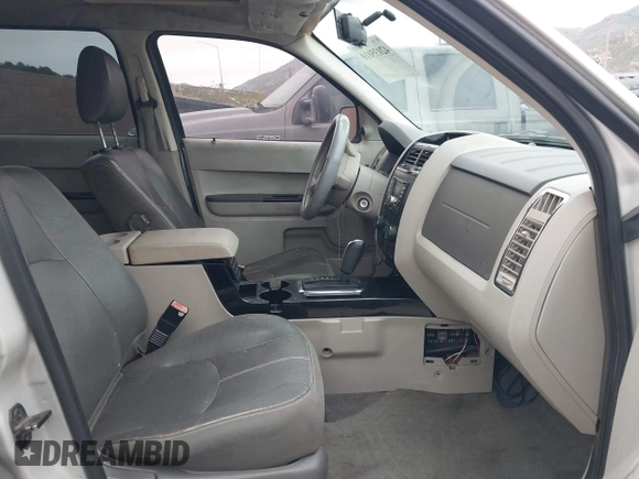 2008 Mazda Tribute Touring with VIN 4F2CZ961X8KM18007, listed as a IAAI auction lot 42035010 with 216,270 mi miles. Bid and sale history available at carsss.com. Image 5.