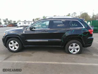 2011 Jeep Grand Cherokee Laredo with VIN 1J4RR4GTXBC538060, listed as a IAAI auction lot 41964694 with 152,999 mi miles. Bid and sale history available at carsss.com. Image 15.