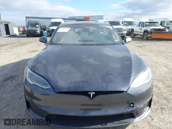 2021 Tesla Model S Plaid with VIN 5YJSA1E60MF455768, listed as a IAAI auction lot 41603504 with 27,398 mi miles. Bid and sale history available at carsss.com. Image 12.