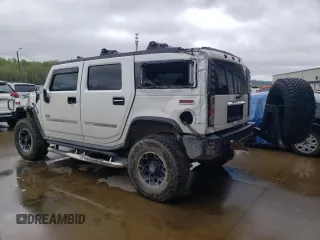 2003 Hummer H2 with VIN 5GRGN23U43H128269, listed as a Copart auction lot 47992444 with 153,360 mi miles and Salvage Title. Bid and sale history available at carsss.com. Image 2.