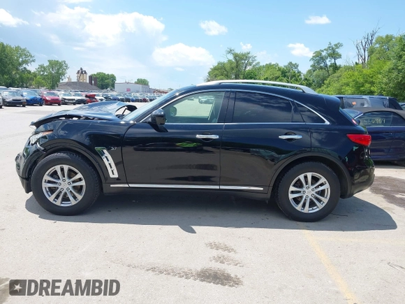2015 Infiniti QX70 with VIN JN8CS1MW1FM482625, listed as a IAAI auction lot 42332365 with 88,912 mi miles and . Bid and sale history available at DreamBid. Image 14.