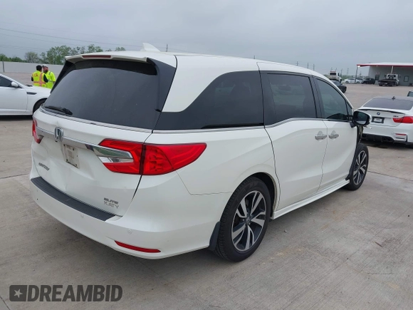 2019 Honda Odyssey Elite with VIN 5FNRL6H96KB022514, listed as a IAAI auction lot 41867864 with 62,749 mi miles and . Bid and sale history available at DreamBid. Image 4.