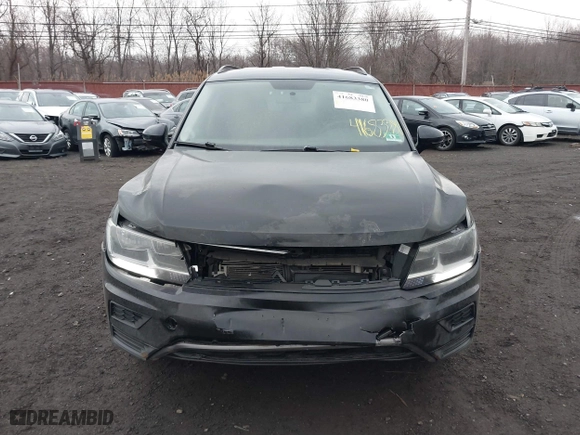 2018 Volkswagen Tiguan S with VIN 3VV1B7AX9JM091210, listed as a IAAI auction lot 41683380 with 63,627 mi miles. Bid and sale history available at carsss.com. Image 12.