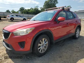 2014 Mazda CX-5 Sport with VIN JM3KE4BE1E0338127, listed as a Copart auction lot 63407415 with 129,782 mi miles and Clean title. Bid and sale history available at DreamBid. Image 1.