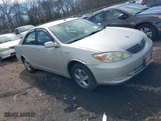 2003 Toyota Camry LE with VIN 4T1BE32K33U726440, listed as a IAAI auction lot 41831850 with 999,999 mi miles. Bid and sale history available at carsss.com. Image 1.