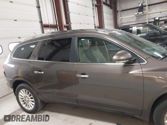2012 Buick Enclave Leather with VIN 5GAKVCED4CJ223097, listed as a IAAI auction lot 42053378 with 125,036 mi miles and . Bid and sale history available at carsss.com. Image 14.