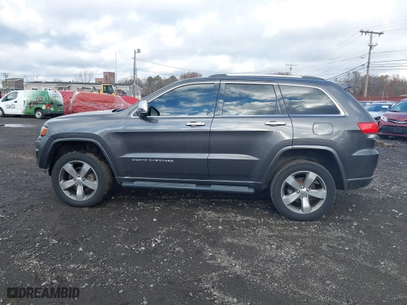 2014 Jeep Grand Cherokee Overland with VIN 1C4RJFCG5EC329377, listed as a IAAI auction lot 40822324 with 106,222 mi miles. Bid and sale history available at carsss.com. Image 15.