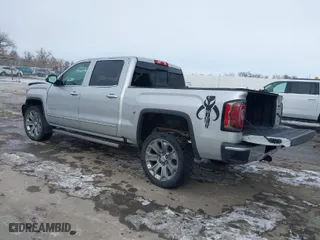2018 GMC Sierra 1500 Denali with VIN 3GTU2PEJXJG472435, listed as a IAAI auction lot 41376821 with 63,177 mi miles. Bid and sale history available at carsss.com. Image 3.