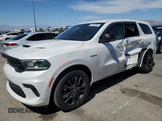 2021 Dodge Durango R/T z VIN 1C4SDJCT4MC558933, wystawiony jako Copart lot #52830365 z przebiegiem 59 882 mil mil oraz Szkoda całkowita • Salvage title. Historia ofert i sprzedaży dostępna na DreamBid. Obrazek 1.