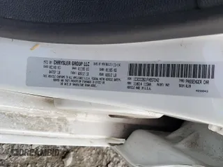 2015 Chrysler 200 S z VIN 1C3CCCBG1FN557242, wystawiony jako Copart lot #54767335 z przebiegiem 62 946 mil mil oraz Szkoda całkowita • Salvage title. Historia ofert i sprzedaży dostępna na DreamBid. Obrazek 12.