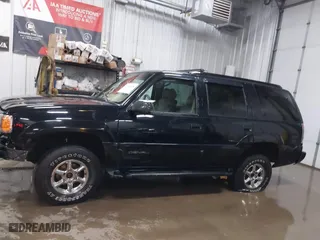 2000 GMC Denali with VIN 1GKEK13R9YR163824, listed as a IAAI auction lot 41245808 with 206,773 mi miles. Bid and sale history available at carsss.com. Image 14.