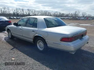 1997 Mercury Grand Marquis LS with VIN 2MELM75W3VX717801, listed as a IAAI auction lot 41920075 with 173,730 mi miles and . Bid and sale history available at DreamBid. Image 3.