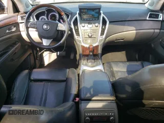 2011 Cadillac SRX Premium Collection with VIN 3GYFNFEYXBS547540, listed as a Copart auction lot 62563895 with 107,136 mi miles and Salvage title. Bid and sale history available at DreamBid. Image 8.