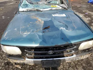 1994 Mazda B-Series Truck LE z VIN 4F4DR17X5RTN10704, wystawiony jako Copart lot #87230804 z przebiegiem 227 476 mil mil oraz Szkoda całkowita • Salvage title. Historia ofert i sprzedaży dostępna na DreamBid. Obrazek 12.