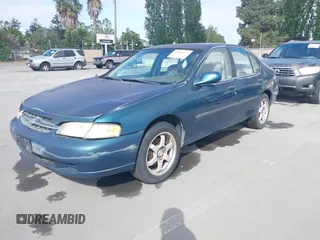 1998 Nissan Altima XE with VIN 1N4DL01D2WC254087, listed as a IAAI auction lot 42184722 with 255,372 mi miles and . Bid and sale history available at carsss.com. Image 2.