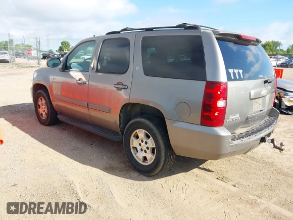 2007 Chevrolet Tahoe LS z VIN 1GNFC13027R231885, wystawiony jako IAAI lot #42750247 z przebiegiem 167 072 mil mil oraz . Historia ofert i sprzedaży dostępna na DreamBid. Obrazek 3.