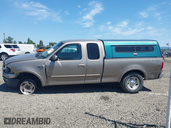 2001 Ford F-150 XL z VIN 2FTRX18L61CA78784, wystawiony jako IAAI lot #42228289 z przebiegiem 208 507 mil mil oraz . Historia ofert i sprzedaży dostępna na DreamBid. Obrazek 14.