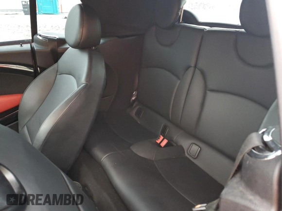 2011 MINI Convertible with VIN WMWZN3C51BTZ78331, listed as a Copart auction lot 73348304 with 94,219 mi miles and Salvage title. Bid and sale history available at DreamBid. Image 10.