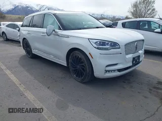 2021 Lincoln Aviator Reserve z VIN 5LM5J7XC6MGL00787, wystawiony jako IAAI lot #41945477 z przebiegiem 95 088 mil mil oraz . Historia ofert i sprzedaży dostępna na DreamBid. Obrazek 1.