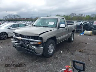 1999 Chevrolet Silverado 1500 LS with VIN 1GCEK14T3XZ161362, listed as a IAAI auction lot 41973905 with 153,845 mi miles. Bid and sale history available at carsss.com. Image 2.