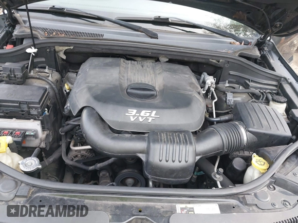 2013 Jeep Grand Cherokee Limited with VIN 1C4RJEBG6DC656719, listed as a IAAI auction lot 40897970 with 133,947 mi miles. Bid and sale history available at carsss.com. Image 10.