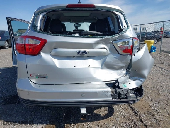 2013 Ford C-Max Energi SEL with VIN 1FADP5CU1DL521392, listed as a IAAI auction lot 41976775 with 121,715 mi miles. Bid and sale history available at carsss.com. Image 6.