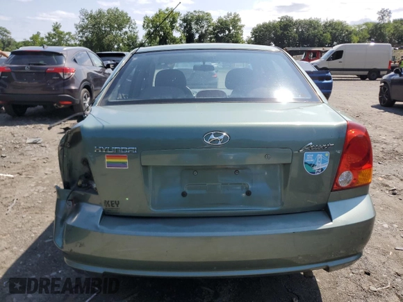 2005 Hyundai Accent GLS with VIN KMHCG45C35U622963, listed as a Copart auction lot 68292114 with 137,655 mi miles and Salvage Title. Bid and sale history available at carsss.com. Image 6.