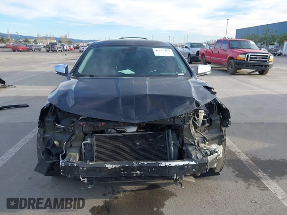 2015 Chevrolet Impala LTZ with VIN 1G1155SLXFU135717, listed as a IAAI auction lot 41242363 with 249,449 mi miles and . Bid and sale history available at DreamBid. Image 13.
