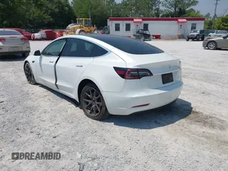 2019 Tesla Model 3 Long Range with VIN 5YJ3E1EB4KF494432, listed as a IAAI auction lot 42009327 with 121,954 mi miles and . Bid and sale history available at DreamBid. Image 3.