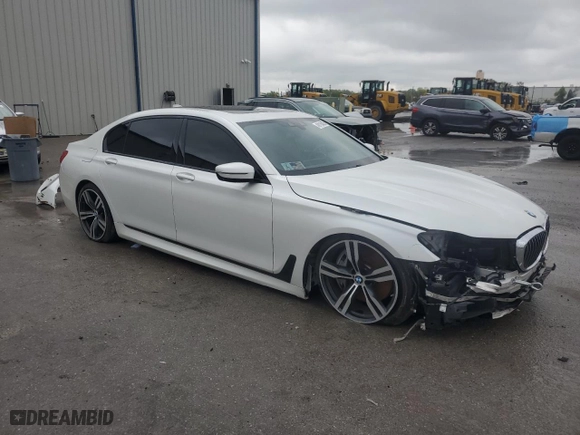2017 BMW 7 Series 750i with VIN WBA7F0C34HGM21478, listed as a Copart auction lot 48116435 with 76,617 mi miles and Salvage Title. Bid and sale history available at carsss.com. Image 4.