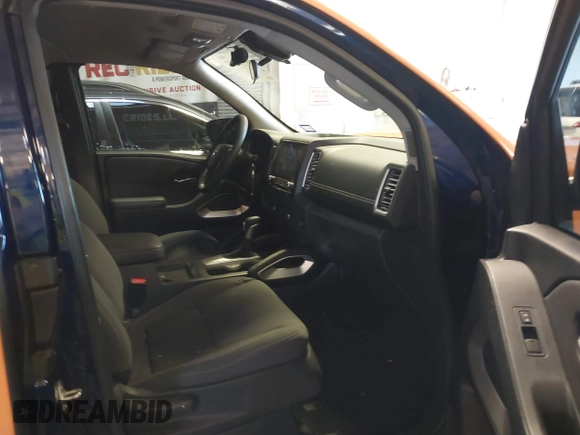 2023 Nissan Frontier S z VIN 1N6ED1CL7PN647236, wystawiony jako IAAI lot #41433437 z przebiegiem 28 683 mil mil oraz . Historia ofert i sprzedaży dostępna na DreamBid. Obrazek 5.