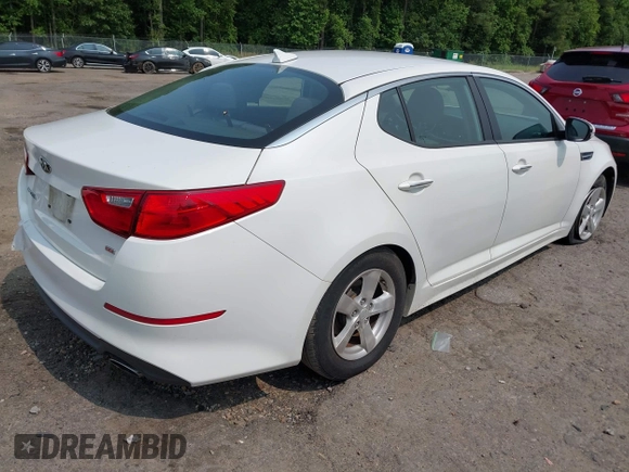 2015 Kia Optima LX z VIN KNAGM4A72F5627037, wystawiony jako IAAI lot #42399339 z przebiegiem 149 612 mil mil oraz . Historia ofert i sprzedaży dostępna na DreamBid. Obrazek 4.