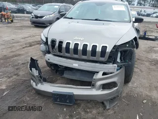 2017 Jeep Cherokee Sport with VIN 1C4PJMAB0HW567739, listed as a IAAI auction lot 41381622 with 120,217 mi miles. Bid and sale history available at carsss.com. Image 6.
