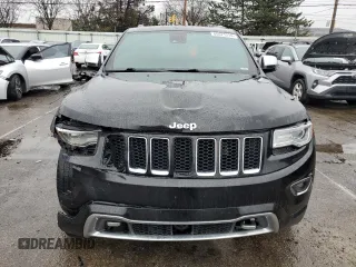 2015 Jeep Grand Cherokee Overland with VIN 1C4RJFCG7FC925995, listed as a Copart auction lot 85421214 with 142,266 mi miles and Salvage Title. Bid and sale history available at carsss.com. Image 5.