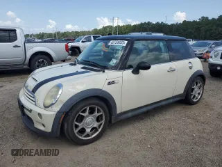 2004 MINI Hardtop S with VIN WMWRE33434TD81033, listed as a Copart auction lot 63759035 with 319,648 mi miles and Clean title. Bid and sale history available at DreamBid. Image 1.