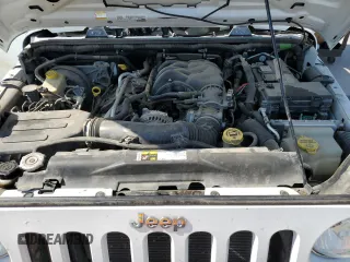 2016 Jeep Wrangler Unlimited Sport RHD z VIN 1C4BJWKG1GL294195, wystawiony jako Copart lot #51274185 z przebiegiem 135 720 mil mil oraz Szkoda całkowita • Salvage title. Historia ofert i sprzedaży dostępna na DreamBid. Obrazek 11.