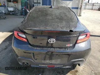 2023 Toyota 86 с VIN JF1ZNBC12P8764877, выставлен на аукционе Copart как лот 46366985 с пробегом 35 570 миль миль и Списание • Salvage title. История ставок и продаж доступна на DreamBid. Изображение 6.