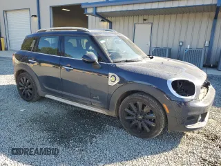 2018 MINI Countryman Cooper S E with VIN WMZYU7C47J3E56451, listed as a Copart auction lot 77193144 with 60,949 mi miles and Salvage Title. Bid and sale history available at carsss.com. Image 4.