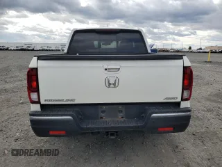2019 Honda Ridgeline RTL-E with VIN 5FPYK3F74KB039057, listed as a Copart auction lot 57350525 with 105,102 mi miles and Salvage title. Bid and sale history available at DreamBid. Image 6.