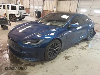 2021 Tesla Model S Plaid with VIN 5YJSA1E6XMF439884, listed as a IAAI auction lot 41622750 with Not provided miles and . Bid and sale history available at DreamBid. Image 2.