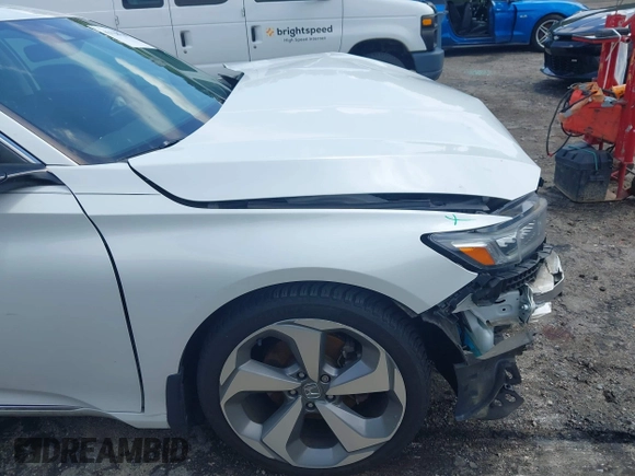 2019 Honda Accord Touring with VIN 1HGCV2F96KA015987, listed as a IAAI auction lot 42528744 with 174,735 mi miles and . Bid and sale history available at DreamBid. Image 21.