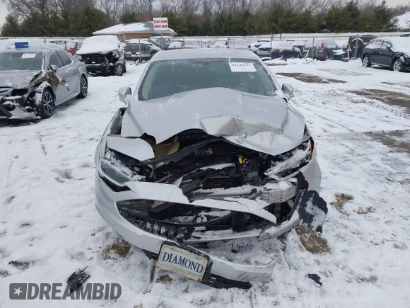 2017 Ford Fusion Titanium with VIN 3FA6P0K91HR117198, listed as a IAAI auction lot 41346552 with 76,951 mi miles. Bid and sale history available at carsss.com. Image 12.